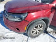 ✅ 2013 Volkswagen Tiguan S • VIN: WVGAV3AX2DW063067 • Lot: 41638749. Listed on IAAI with 150,115 mi. Free auction sales archive from the USA and detailed vehicle history report at DreamBid. Image 13.