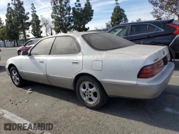 ✅ 1993 Lexus ES 300 • VIN: JT8VK13T2P0216808 • Lot: 85718454. Listed on Copart with Not provided. Free auction sales archive from the USA and detailed vehicle history report at DreamBid. Image 2.