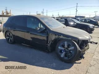 ✅ 2024 BMW iX M60 • VIN: WB533CF01RCR28341 • Lot: 69646904. Wystawiony na Copart z przebiegiem 1 753 mil. Bezpłatny archiwum sprzedaży aukcyjnych z USA i szczegółowy raport historii pojazdu na DreamBid. Zdjęcie 4.