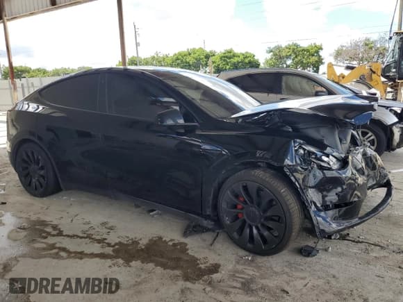 ✅ 2022 Tesla Model Y Performance • VIN: 7SAYGDEF0NF572118 • Lot: 85293695. Listed on Copart with 56,862 mi. Free auction sales archive from the USA and detailed vehicle history report at DreamBid. Image 4.