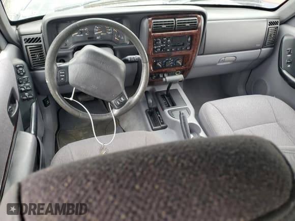 ✅ 1997 Jeep Cherokee Country • VIN: 1J4FJ78S4VL589852 • Lot: 56294015. Listed on Copart with 189,530 mi. Free auction sales archive from the USA and detailed vehicle history report at DreamBid. Image 8.