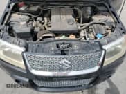 ✅ 2012 Suzuki Grand Vitara • VIN: JS3TE0D59C4100035 • Lot: 51780435. Wystawiony na Copart z przebiegiem 49 620 mil. Bezpłatny archiwum sprzedaży aukcyjnych z USA i szczegółowy raport historii pojazdu na DreamBid. Zdjęcie 12.