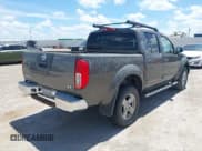 ✅ 2005 Nissan Frontier LE • VIN: 1N6AD07U35C420873 • Lot: 42585026. Listed on IAAI with 395,862 mi. Free auction sales archive from the USA and detailed vehicle history report at DreamBid. Image 4.