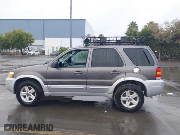 ✅ 2006 Ford Escape Hybrid • VIN: 1FMCU95H66KB49378 • Lot: 43725751. Wystawiony na IAAI z przebiegiem 239 245 mil. Bezpłatny archiwum sprzedaży aukcyjnych z USA i szczegółowy raport historii pojazdu na DreamBid. Zdjęcie 14.