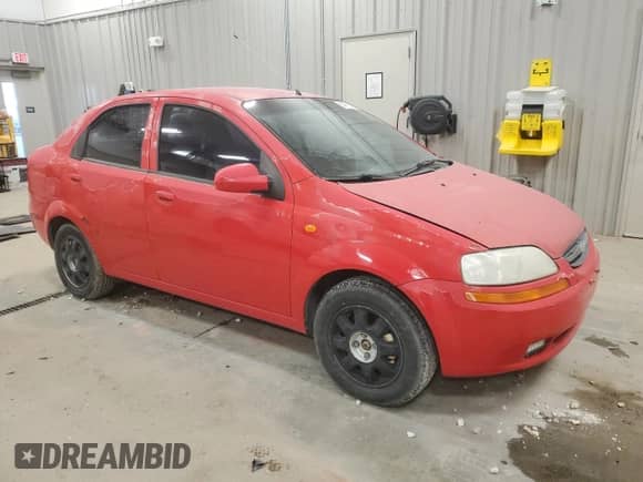 2004 Chevrolet Aveo LS z VIN KL1TJ52614B258568, wystawiony jako Copart lot #84412874 z przebiegiem 150 051 mil mil oraz Czysty tytuł • Clean title. Historia ofert i sprzedaży dostępna na DreamBid. Obrazek 4.