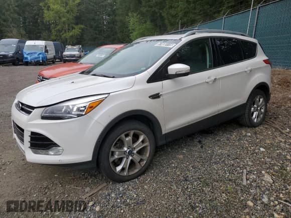 ✅ 2015 Ford Escape Titanium • VIN: 1FMCU9J98FUB31984 • Lot: 57406115. Listed on Copart with 116,681 mi. Free auction sales archive from the USA and detailed vehicle history report at DreamBid. Image 1.