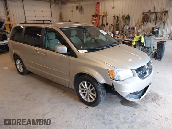 ✅ 2014 Dodge Grand Caravan SXT • VIN: 2C4RDGCG2ER105598 • Lot: 42648383. Listed on IAAI with 103,238 mi. Free auction sales archive from the USA and detailed vehicle history report at DreamBid. Image 1.