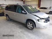✅ 2005 Dodge Caravan SXT • VIN: 2D4GP44L15R459026 • Lot: 43711842. Listed on IAAI with 203,644 mi. Free auction sales archive from the USA and detailed vehicle history report at DreamBid. Image 1.