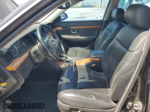 ✅ 2004 Kia Amanti • VIN: KNALD124745022218 • Lot: 67812965. Listed on Copart with 144,696 mi. Free auction sales archive from the USA and detailed vehicle history report at DreamBid. Image 7.