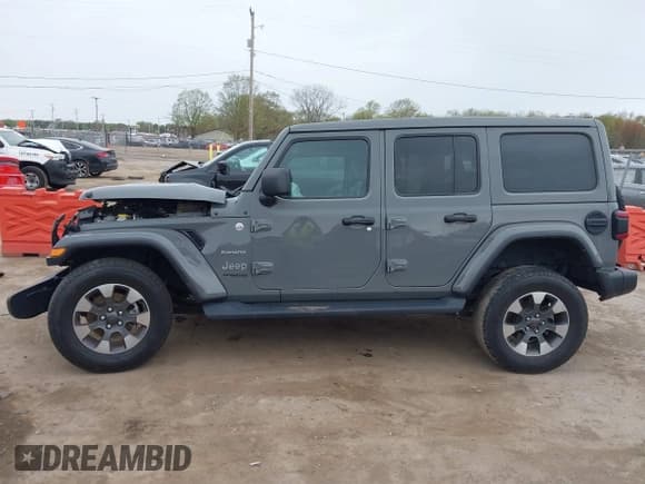✅ 2022 Jeep Wrangler Unlimited Sahara • VIN: 1C4HJXEG7NW138105 • Lot: 42146898. Listed on IAAI with Not provided. Free auction sales archive from the USA and detailed vehicle history report at DreamBid. Image 15.