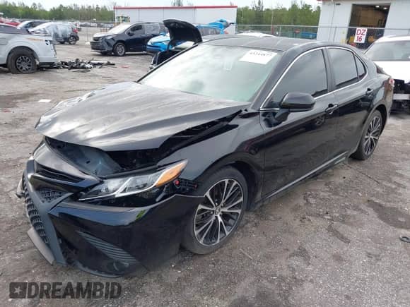 2019 Toyota Camry LE with VIN 4T1B11HK1KU737295, listed as a IAAI auction lot 43244877 with 95,284 mi miles and . Bid and sale history available at DreamBid. Image 17.