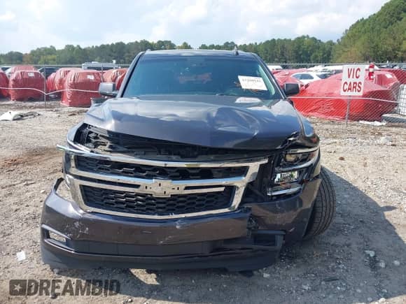 2015 Chevrolet Tahoe LT z VIN 1GNSCBKC3FR649211, wystawiony jako IAAI lot #43260542 z przebiegiem 88 436 mil mil oraz . Historia ofert i sprzedaży dostępna na DreamBid. Obrazek 13.