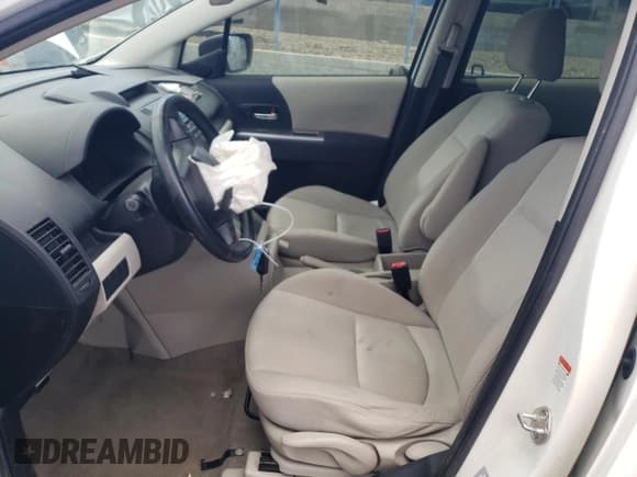 ✅ 2010 Mazda 5 Sport • VIN: JM1CR2W33A0385622 • Лот: 47194125. Опубликован ранее на Copart с пробегом 165 721 миль. Бесплатный доступ к архиву аукционных продаж из США и подробный отчёт об истории автомобиля на DreamBid. Изображение 7.