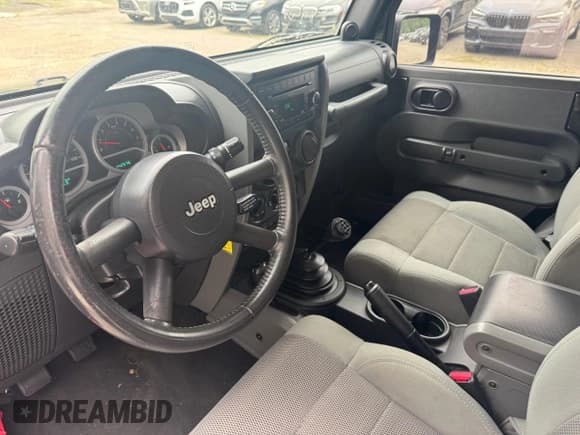 ✅ 2007 Jeep Wrangler Rubicon • VIN: 1J4GA64127L170574 • Лот: 60906965. Опубликован ранее на Copart с пробегом 142 976 миль. Бесплатный доступ к архиву аукционных продаж из США и подробный отчёт об истории автомобиля на DreamBid. Изображение 9.