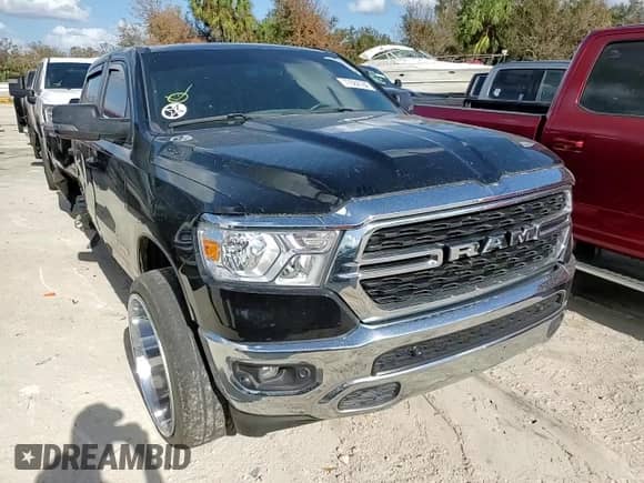 2023 Ram 1500 Lone Star with VIN 1C6RREMT8PN565793, listed as a Copart auction lot 77084184 with 18,825 mi miles and Salvage title. Bid and sale history available at DreamBid. Image 14.