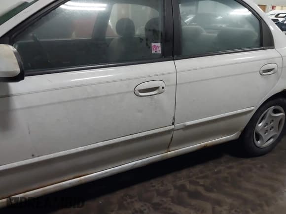 ✅ 2003 Kia Spectra • VIN: KNAFB121235300577 • Лот: 43825776. Опубликован ранее на IAAI с пробегом 132 271 миль. Бесплатный доступ к архиву аукционных продаж из США и подробный отчёт об истории автомобиля на DreamBid. Изображение 6.