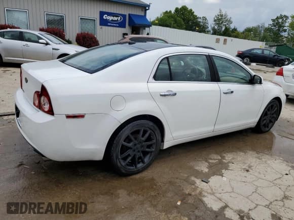 ✅ 2010 Chevrolet Malibu LTZ • VIN: 1G1ZE5E70AF142416 • Lot: 63426164. Listed on Copart with 184,993 mi. Free auction sales archive from the USA and detailed vehicle history report at DreamBid. Image 3.