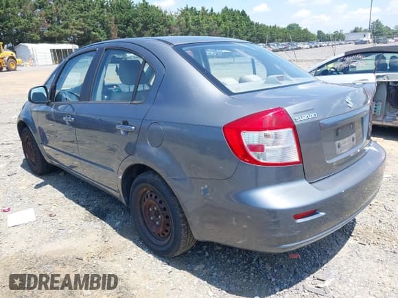 ✅ 2009 Suzuki SX4 FWD • VIN: JS2YC412696200124 • Lot: 42610404. Wystawiony na IAAI z przebiegiem 176 935 mil. Bezpłatny archiwum sprzedaży aukcyjnych z USA i szczegółowy raport historii pojazdu na DreamBid. Zdjęcie 3.