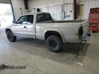 1999 Dodge Dakota SLT с VIN 1B7GG22Y1XS255974, выставлен на аукционе Copart как лот 69279844 с пробегом 107 100 миль миль и Чистый • Clean title. История ставок и продаж доступна на DreamBid. Изображение 2.