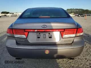 2006 Hyundai Azera SE z VIN KMHFC46F26A133300, wystawiony jako Copart lot #74730624 z przebiegiem 100 963 mil mil oraz Szkoda całkowita • Salvage title. Historia ofert i sprzedaży dostępna na DreamBid. Obrazek 6.
