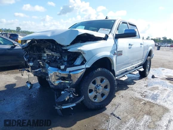 ✅ 2017 Ram 2500 Laramie • VIN: 3C6UR5FLXHG518900 • Lot: 42682604. Wystawiony na IAAI z przebiegiem 96 699 mil. Bezpłatny archiwum sprzedaży aukcyjnych z USA i szczegółowy raport historii pojazdu na DreamBid. Zdjęcie 2.