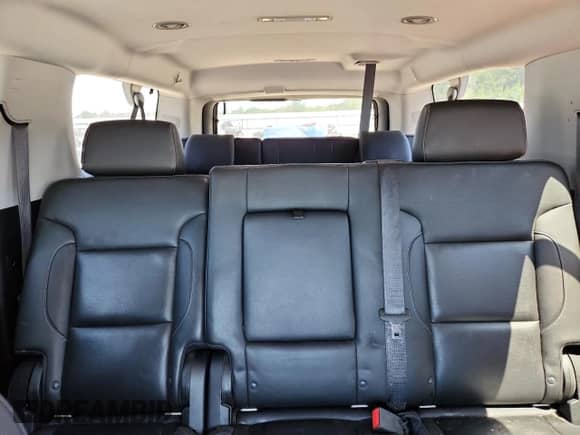 2019 Chevrolet Suburban Premier with VIN 1GNSCJKCXKR110511, listed as a Copart auction lot 71028945 with 87,669 mi miles and Salvage title. Bid and sale history available at DreamBid. Image 10.