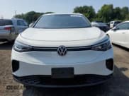 ✅ 2023 Volkswagen ID.4 Pro • VIN: 1V2DNPE89PC042636 • Лот: 67781985. Опубликован ранее на Copart с пробегом 14 866 миль. Бесплатный доступ к архиву аукционных продаж из США и подробный отчёт об истории автомобиля на DreamBid. Изображение 5.