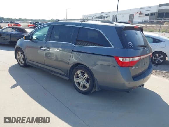 ✅ 2012 Honda Odyssey Touring • VIN: 5FNRL5H97CB501620 • Лот: 43005068. Опубликован ранее на IAAI с пробегом 160 233 миль. Бесплатный доступ к архиву аукционных продаж из США и подробный отчёт об истории автомобиля на DreamBid. Изображение 3.