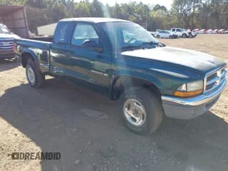✅ 2002 Dodge Dakota SLT • VIN: 1B7GG42NX2S657678 • Lot: 43652421. Wystawiony na IAAI z przebiegiem 201 992 mil. Bezpłatny archiwum sprzedaży aukcyjnych z USA i szczegółowy raport historii pojazdu na DreamBid. Zdjęcie 1.