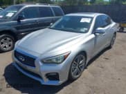✅ 2014 Infiniti Q50 Sport • VIN: JN1BV7AR7EM697122 • Lot: 42573618. Listed on IAAI with 55,051 mi. Free auction sales archive from the USA and detailed vehicle history report at DreamBid. Image 2.