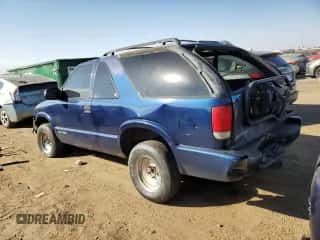 2001 Chevrolet Blazer LS z VIN 1GNCT18W91K189599, wystawiony jako Copart lot #74595674 z przebiegiem 208 309 mil mil oraz Szkoda całkowita • Salvage title. Historia ofert i sprzedaży dostępna na DreamBid. Obrazek 2.