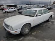 ✅ 1997 Jaguar XJ Vanden Plas • VIN: SAJKX6245VC805748 • Lot: 44275015. Wystawiony na Copart z przebiegiem 70 473 mil. Bezpłatny archiwum sprzedaży aukcyjnych z USA i szczegółowy raport historii pojazdu na DreamBid. Zdjęcie 1.