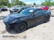 ✅ 2025 Ford Mustang EcoBoost • VIN: 1FA6P8TH0S5103047 • Lot: 42524671. Listed on IAAI with 8,281 mi. Free auction sales archive from the USA and detailed vehicle history report at DreamBid. Image 2.