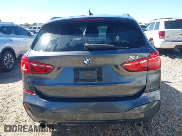 ✅ 2018 BMW X1 sDrive28i • VIN: WBXHU7C33J5H38892 • Лот: 43510586. Опубликован ранее на IAAI с пробегом 186 277 миль. Бесплатный доступ к архиву аукционных продаж из США и подробный отчёт об истории автомобиля на DreamBid. Изображение 16.