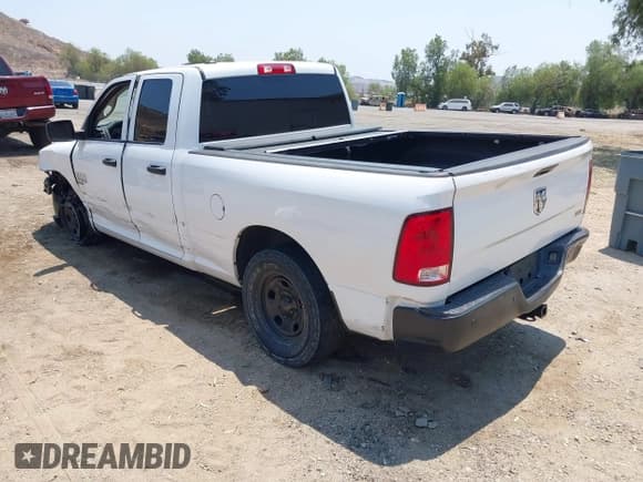✅ 2019 Ram 1500 Tradesman • VIN: 1C6RR6FG2KS719656 • Lot: 42737371. Listed on IAAI with 131,256 mi. Free auction sales archive from the USA and detailed vehicle history report at DreamBid. Image 3.