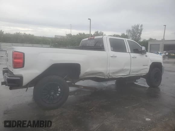 ✅ 2015 Chevrolet Silverado 2500HD LT • VIN: 1GC1CVE81FF100234 • Lot: 69316554. Listed on Copart with 195,795 mi. Free auction sales archive from the USA and detailed vehicle history report at DreamBid. Image 3.
