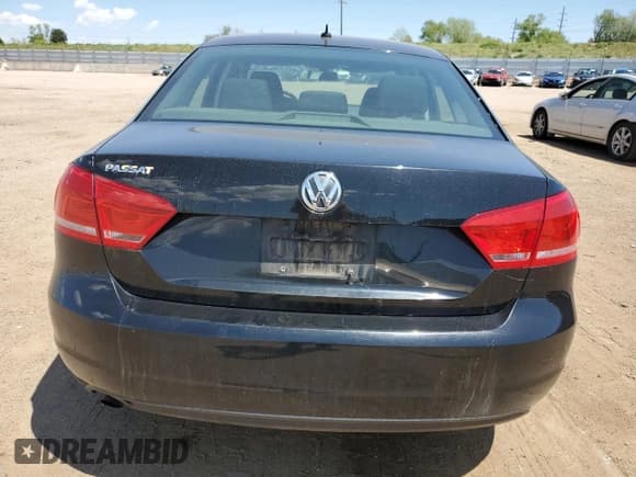 ✅ 2012 Volkswagen Passat S • VIN: 1VWAH7A3XCC027401 • Lot: 57490225. Listed on Copart with 141,298 mi. Free auction sales archive from the USA and detailed vehicle history report at DreamBid. Image 6.