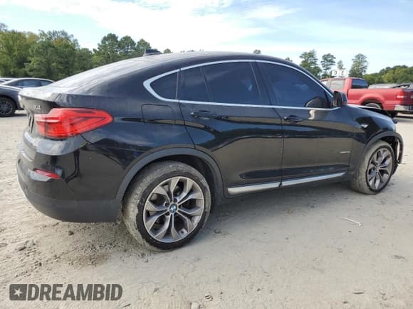 ✅ 2018 BMW X4 xDrive28i • VIN: 5UXXW3C58J0T82820 • Lot: 81069445. Listed on Copart with 103,568 mi. Free auction sales archive from the USA and detailed vehicle history report at DreamBid. Image 3.
