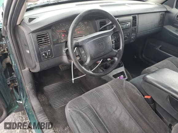 ✅ 2004 Dodge Dakota SLT • VIN: 1D7HG42N64S597573 • Lot: 87504315. Wystawiony na Copart z przebiegiem 188 865 mil. Bezpłatny archiwum sprzedaży aukcyjnych z USA i szczegółowy raport historii pojazdu na DreamBid. Zdjęcie 8.