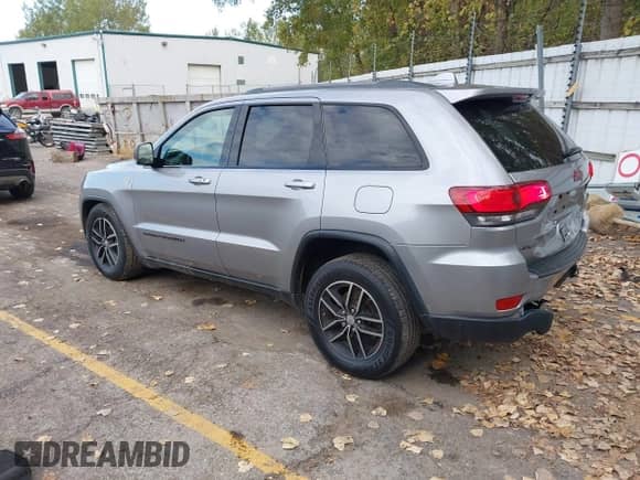 2017 Jeep Grand Cherokee Trailhawk with VIN 1C4RJFLG1HC733460, listed as a IAAI auction lot 43428007 with 149,029 mi miles and . Bid and sale history available at DreamBid. Image 3.