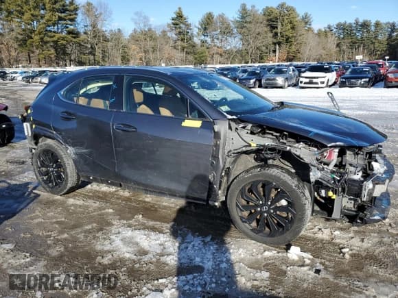✅ 2023 Lexus UX 250h Premium • VIN: JTHP9JBH8P2064930 • Lot: 44403535. Listed on Copart with 28,350 mi. Free auction sales archive from the USA and detailed vehicle history report at DreamBid. Image 4.