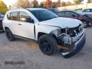 ✅ 2014 Jeep Compass Sport • VIN: 1C4NJDBB5ED784586 • Lot: 43597172. Listed on IAAI with 189,821 mi. Free auction sales archive from the USA and detailed vehicle history report at DreamBid. Image 1.