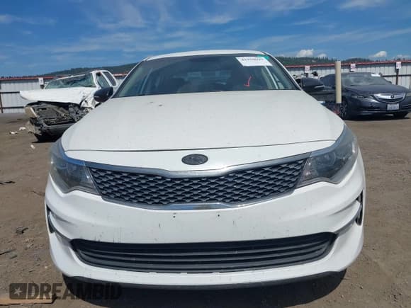 ✅ 2017 Kia Optima LX • VIN: 5XXGT4L17HG143104 • Lot: 42950099. Listed on IAAI with 57,762 mi. Free auction sales archive from the USA and detailed vehicle history report at DreamBid. Image 12.