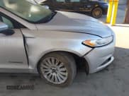 ✅ 2015 Ford Fusion S Hybrid • VIN: 3FA6P0UU3FR116522 • Лот: 43398304. Опубликован ранее на IAAI с пробегом 170 901 миль. Бесплатный доступ к архиву аукционных продаж из США и подробный отчёт об истории автомобиля на DreamBid. Изображение 6.