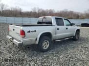 ✅ 2004 Dodge Dakota SLT • VIN: 1D7HG48NX4S677465 • Lot: 51044735. Wystawiony na Copart z przebiegiem 196 854 mil. Bezpłatny archiwum sprzedaży aukcyjnych z USA i szczegółowy raport historii pojazdu na DreamBid. Zdjęcie 3.