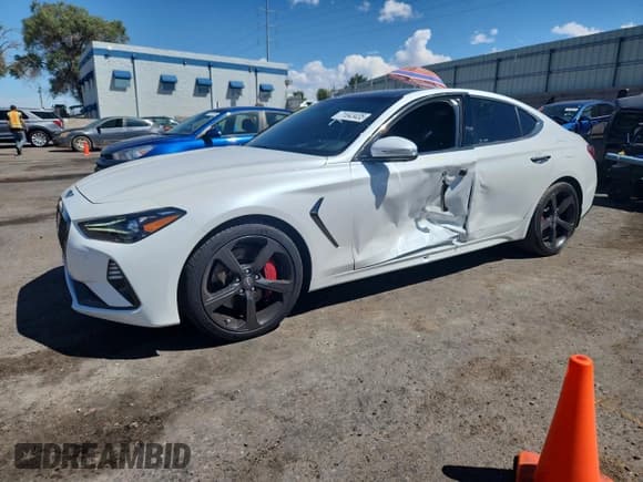 ✅ 2021 Genesis G70 3.3T • VIN: KMTG34LE2MU070569 • Лот: 71643435. Опубликован ранее на Copart с пробегом 30 580 миль. Бесплатный доступ к архиву аукционных продаж из США и подробный отчёт об истории автомобиля на DreamBid. Изображение 1.