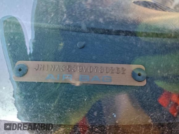 ✅ 1997 Mazda MX-5 Miata • VIN: JM1NA3539V0730262 • Lot: 95009635. Wystawiony na Copart z przebiegiem 44 843 mil. Bezpłatny archiwum sprzedaży aukcyjnych z USA i szczegółowy raport historii pojazdu na DreamBid. Zdjęcie 12.