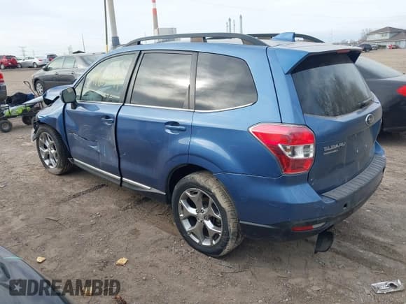 ✅ 2016 Subaru Forester Touring • VIN: JF2SJAXC4GH417596 • Lot: 41832344. Listed on IAAI with 88,735 mi. Free auction sales archive from the USA and detailed vehicle history report at DreamBid. Image 3.