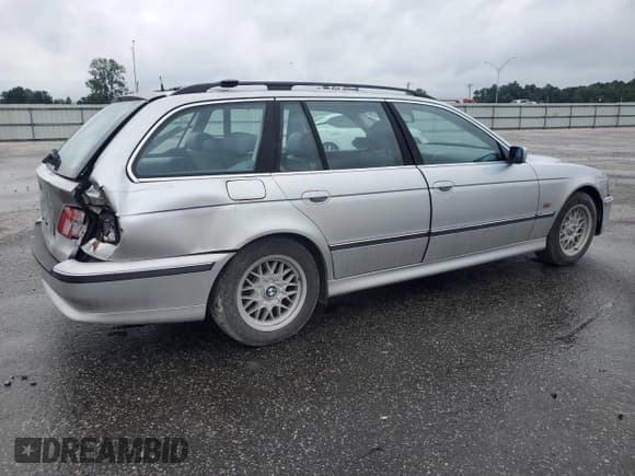 ✅ 1999 BMW 5 Series 528i • VIN: WBADP6346XBV62124 • Lot: 66775254. Listed on Copart with 93,896 mi. Free auction sales archive from the USA and detailed vehicle history report at DreamBid. Image 3.
