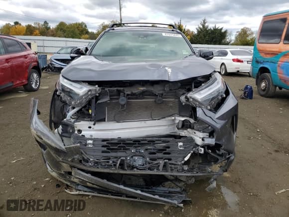 ✅ 2024 Toyota RAV4 Hybrid XSE • VIN: JTME6RFV2RD555887 • Лот: 87075845. Опубликован ранее на Copart с пробегом 99 589 миль. Бесплатный доступ к архиву аукционных продаж из США и подробный отчёт об истории автомобиля на DreamBid. Изображение 5.